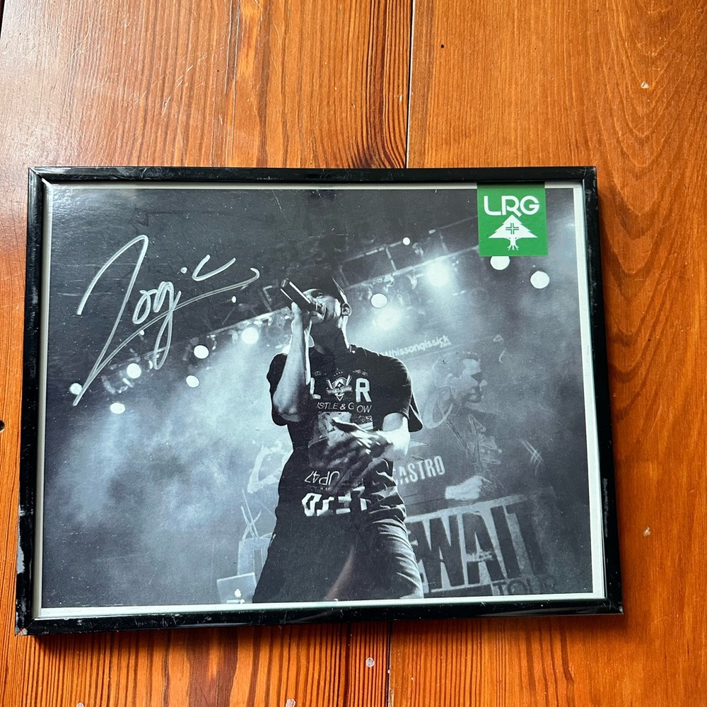 Framed photo, autographed by Logic